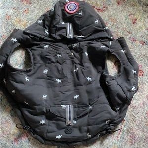 Adorable fleece lined reversible dog jacket.